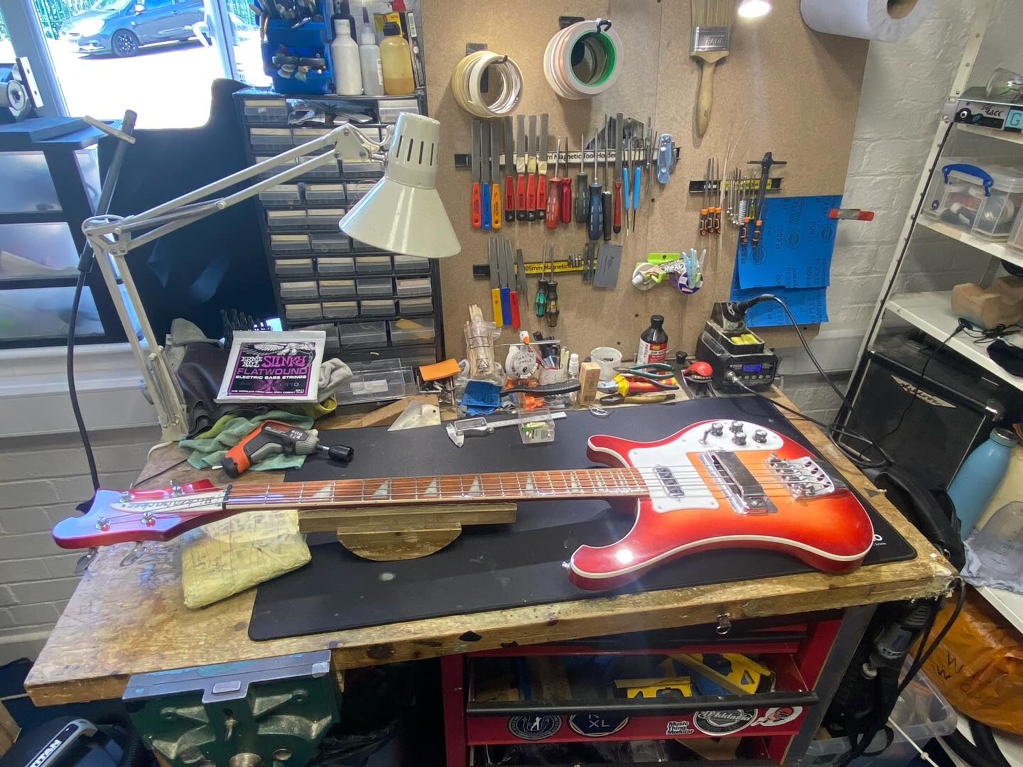 Electric guitar being worked on in the TGRW workshop